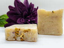 Load image into Gallery viewer, Lavender and Lemon soap is a scented with a lavender and  lemon essential oil blend. Topped with chamomile and lavender petals. Made with plant based ingredients. Great for total body care.
