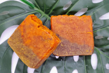 Load image into Gallery viewer, Handcrafted with all natural ingredients (saponified shea butter, cocoa butter, coconut oil, olive oil, and castor oil)free from harsh chemicals. Formulated using a plant based recipe, designed to cleanse your skin and provide moisturization. Our soap designs and fragrances are made with natural colorants and pure essential oils. Naturally pigmented with superfood, turmeric and annatto  powder. Scented with lemon essential oil. Helps with those with dry skin conditions and acne.
