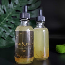 Load image into Gallery viewer, Moisturizing natural oil made with Sweet Almond oil, Shea Nut oil, Carrot Seed oil, and Calendula oil.  Blended to nourish normal to dry skin Naturally scented with calming chamomile flowers and calendula oil Versatile and may be used for hair, skin, or nails. 2 ounces of natural skin healing 
