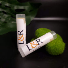 Load image into Gallery viewer, Healing properties for dry, cracked lips. Provides lasting lip moisture. Made with organic unrefined grade A shea butter, sweet almond oil, candelilla wax, calendula oil, and vitamin E. Unscented, naturally pigmented by ingredients. Vegan lip care.
