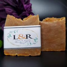 Load image into Gallery viewer, Handcrafted with all natural ingredients (saponified shea butter, cocoa butter, coconut oil, olive oil, and castor oil)free from harsh chemicals. Formulated using a plant based recipe, designed to cleanse your skin and provide moisturization. Our soap designs and fragrances are made with natural colorants and pure essential oils. Naturally pigmented with superfood, turmeric and annatto  powder. Scented with lemon essential oil. Helps with those with dry skin conditions and acne.
