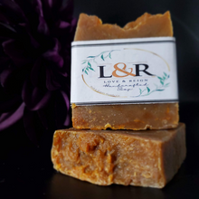 Load image into Gallery viewer, Handcrafted with all natural ingredients (saponified shea butter, cocoa butter, coconut oil, olive oil, and castor oil)free from harsh chemicals. Formulated using a plant based recipe, designed to cleanse your skin and provide moisturization. Our soap designs and fragrances are made with natural colorants and pure essential oils. Naturally pigmented with superfood, turmeric and annatto  powder. Scented with lemon essential oil. Helps with those with dry skin conditions and acne.
