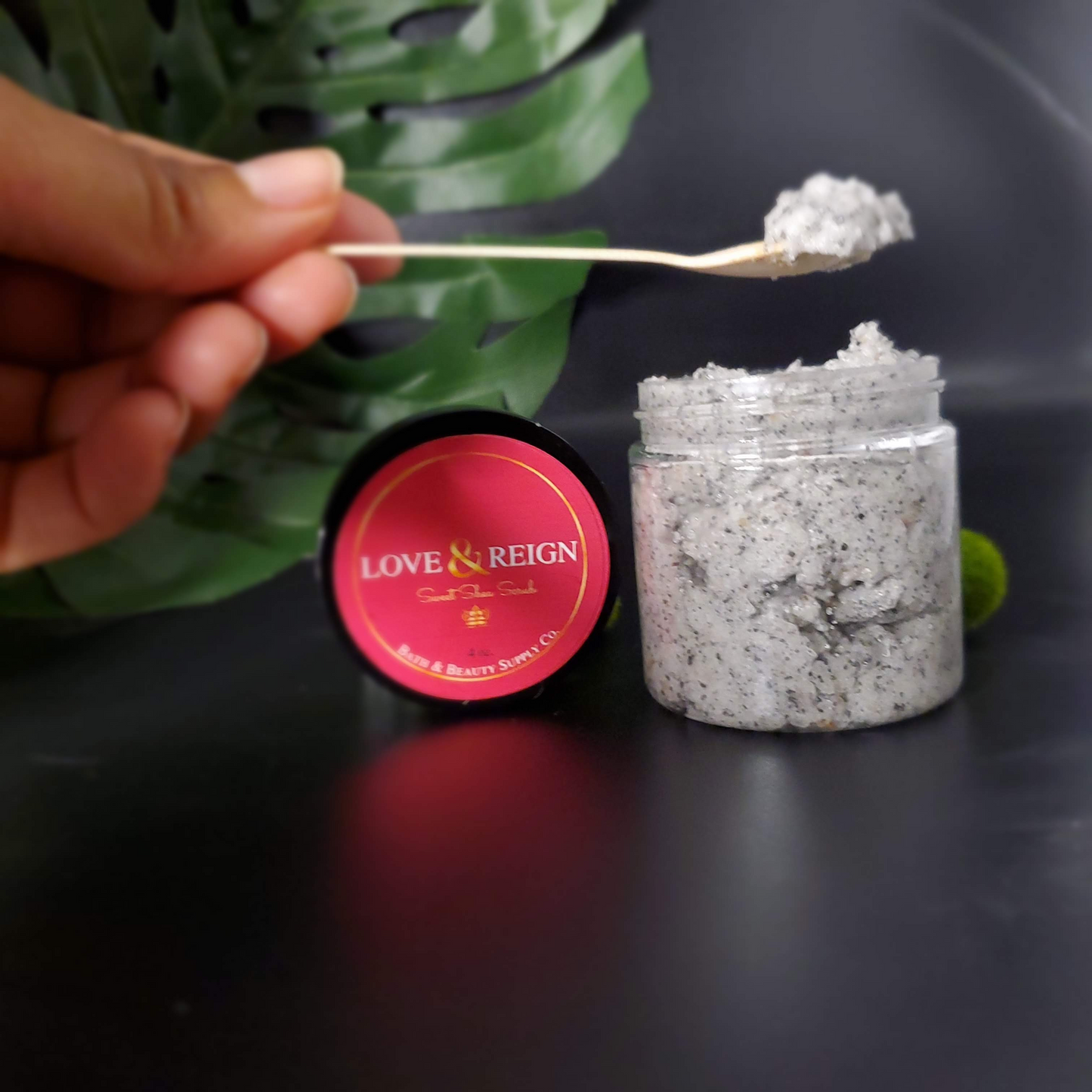 Salty and Sweet! Organic shea butter scrub blended with fine pink and black sea salt, fine sugar, hemp oil, and hibiscus infused oil. Naturally pigmented with Hibiscus petals. Sweet floral scent using a pure essential oil blend of lemon, orange, Ylang Ylang, sandalwood, and jasmine.  Great for getting that close shave, removing dead skin cells, and moisturizing.  4 ounces of natural care